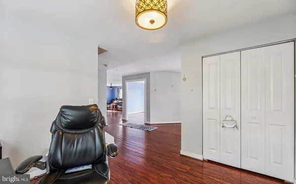 a view of a livingroom with furniture and wooden floor