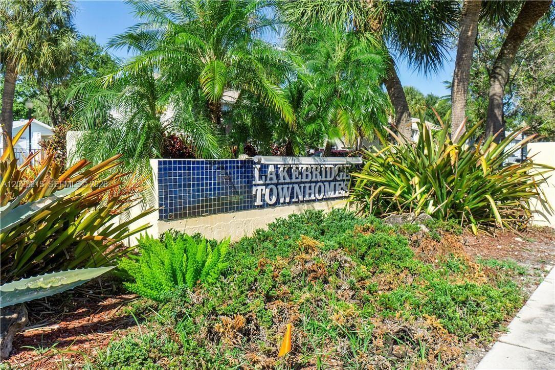13 Southwest 3rd Street, Unit 13 Pompano Beach, FL 33060 - Photo 36 of 44 a view of outdoor space with garden