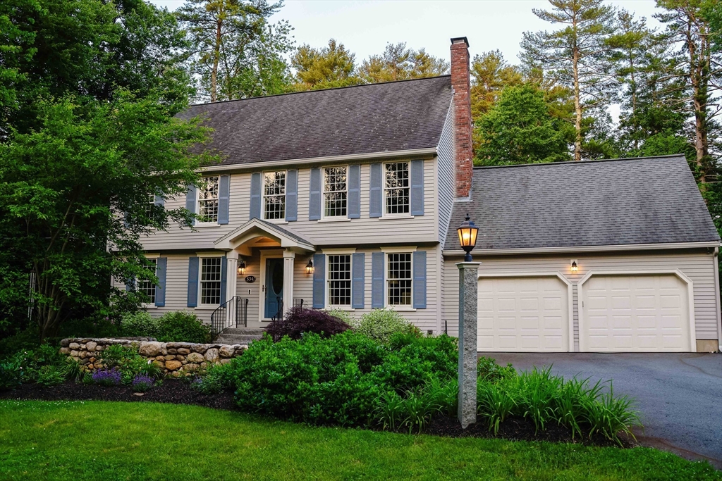 534 Boston Street North Andover, MA 01845 - Photo 1 of 1 a aerial view of a house with a yard and a garden