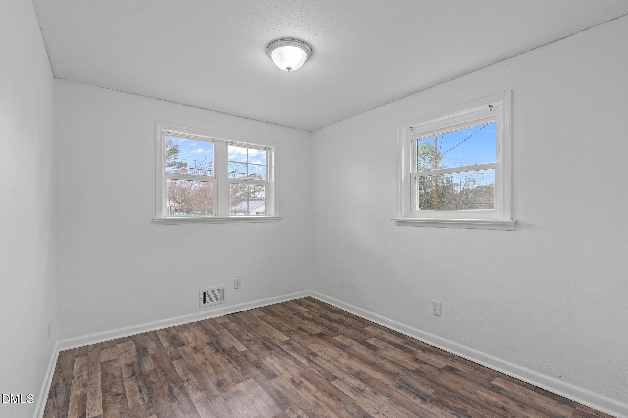 311 New Rand Road Garner, NC 27529 - Photo 12 of 31 wooden floor in an empty room