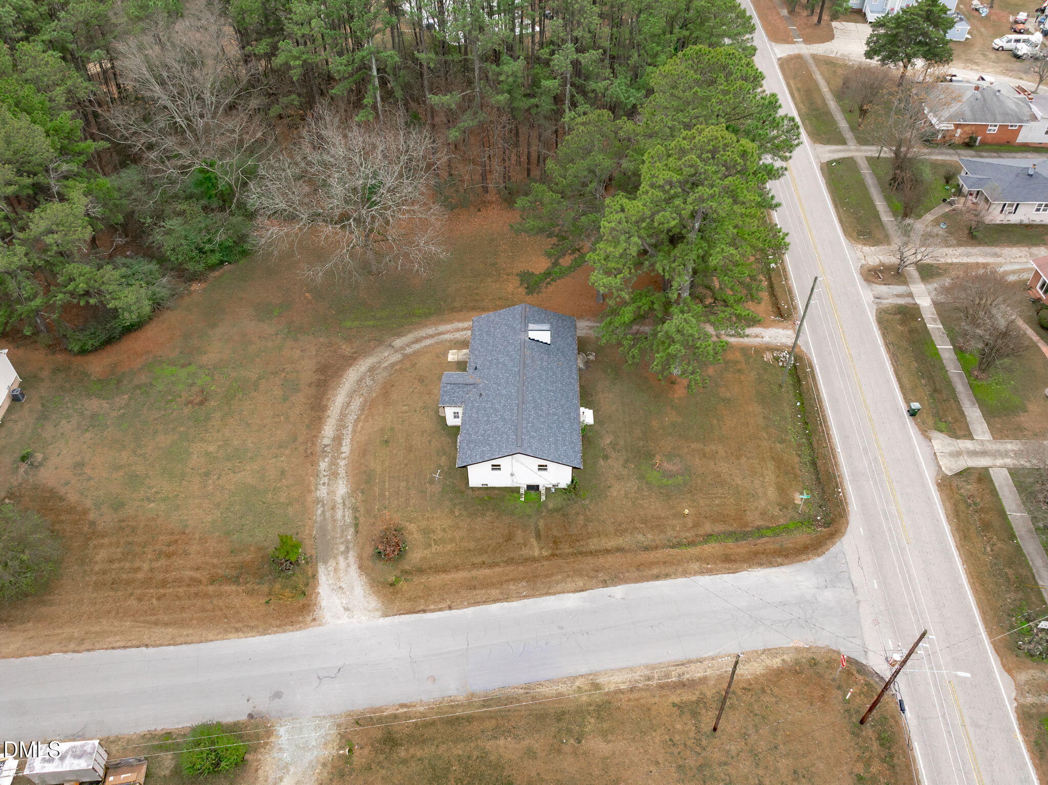 311 New Rand Road Garner, NC 27529 - Photo 26 of 31 an aerial view of a house with a yard