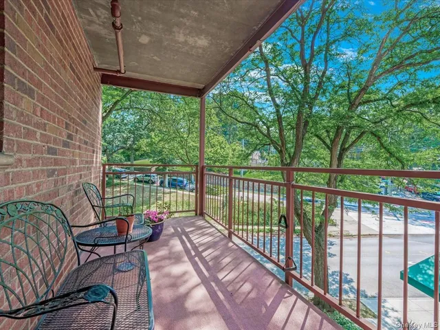 a view of walk in closet and window