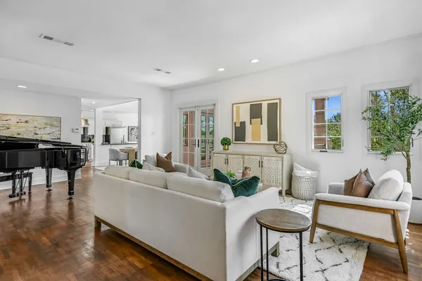 a living room with furniture and a table
