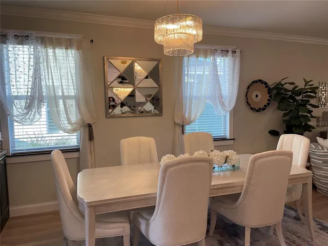 a workspace with furniture and wooden floor