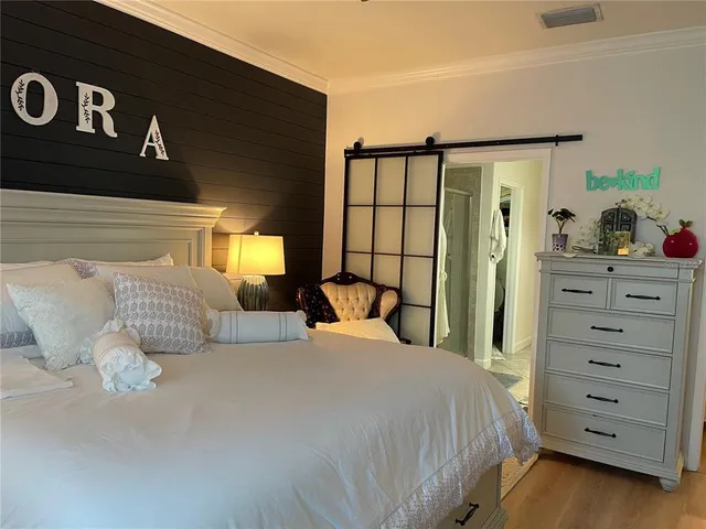 a white toilet sitting next to a white sink