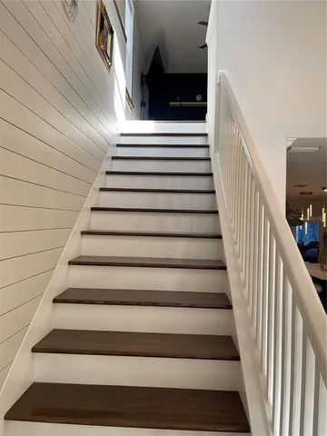 a view of a livingroom with furniture and windows