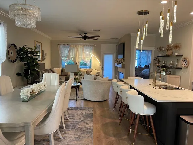 a bathroom with a toilet a sink and a window