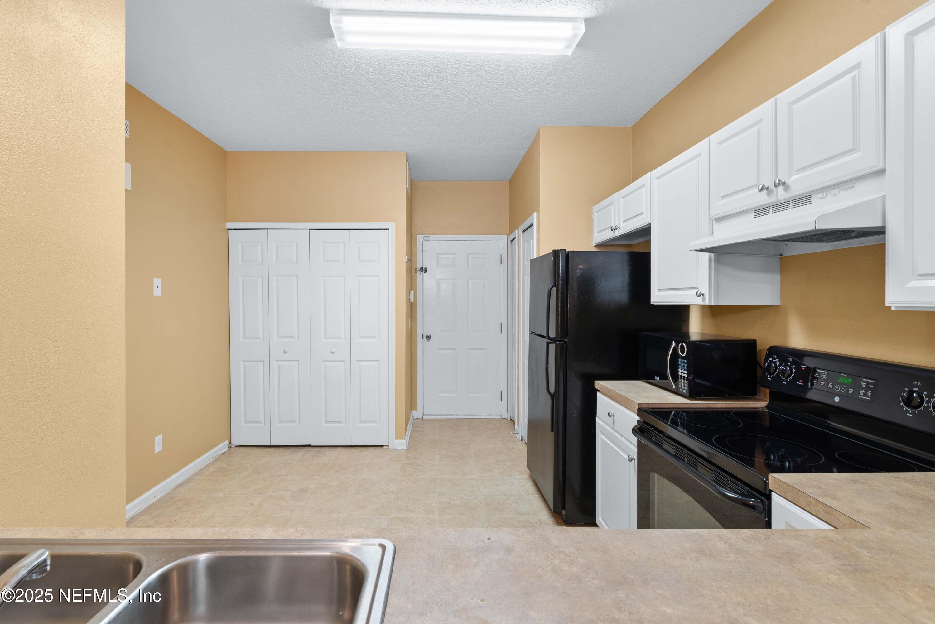 7831 Melvin Road Jacksonville, FL 32210 - Photo 9 of 13 Kitchen 2