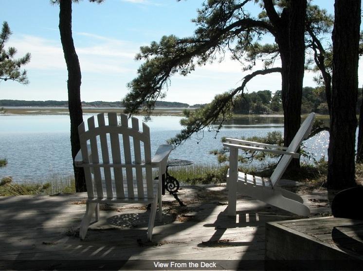 a view of a balcony with chairs