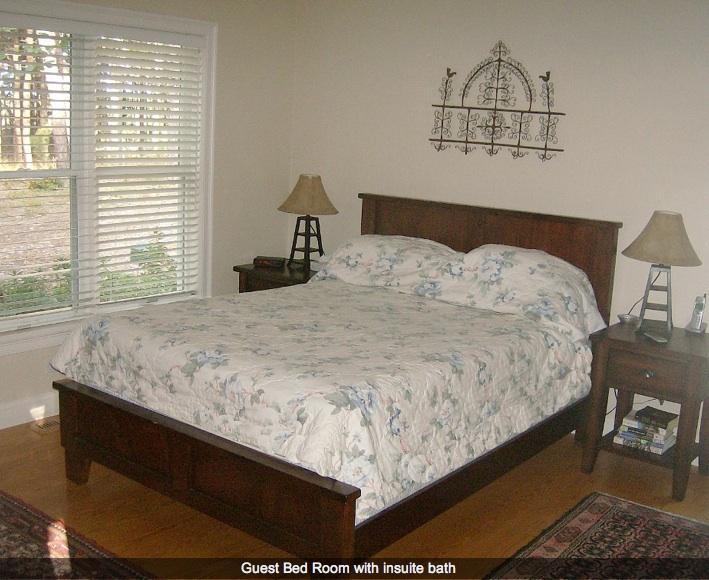 165 Baker Road Wellfleet, MA 02667 - Photo 13 of 20 a bedroom with a bed and window