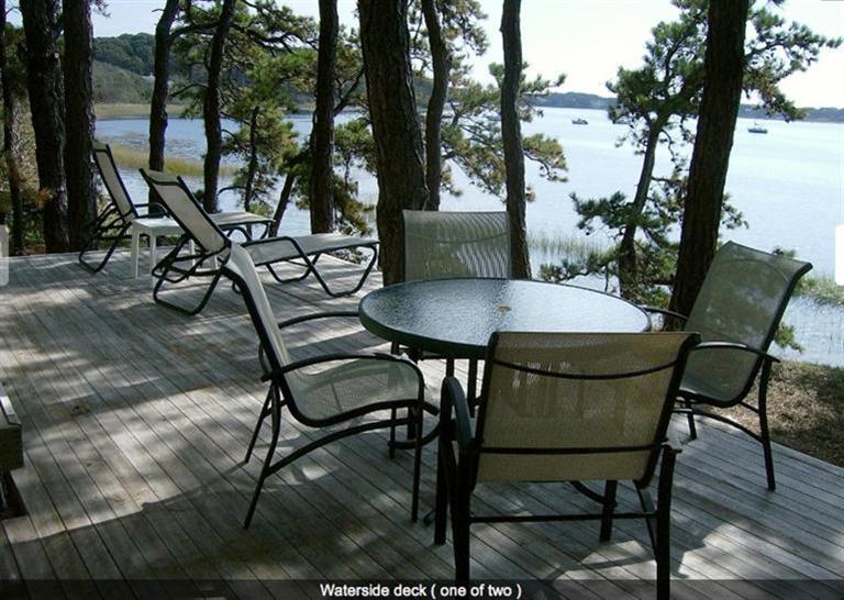 165 Baker Road Wellfleet, MA 02667 - Photo 18 of 20 a view of a chairs and table in the patio