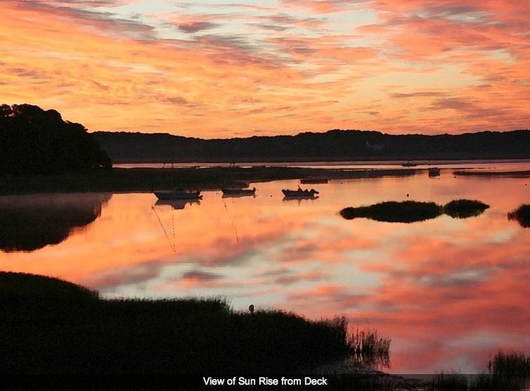 165 Baker Road Wellfleet, MA 02667 - Photo 2 of 20 a view of lake with sunset