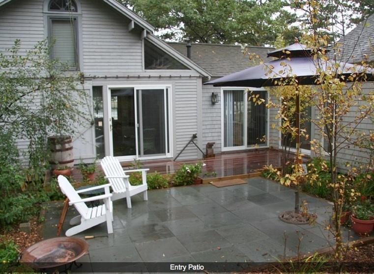 165 Baker Road Wellfleet, MA 02667 - Photo 4 of 20 a front view of a house with garden