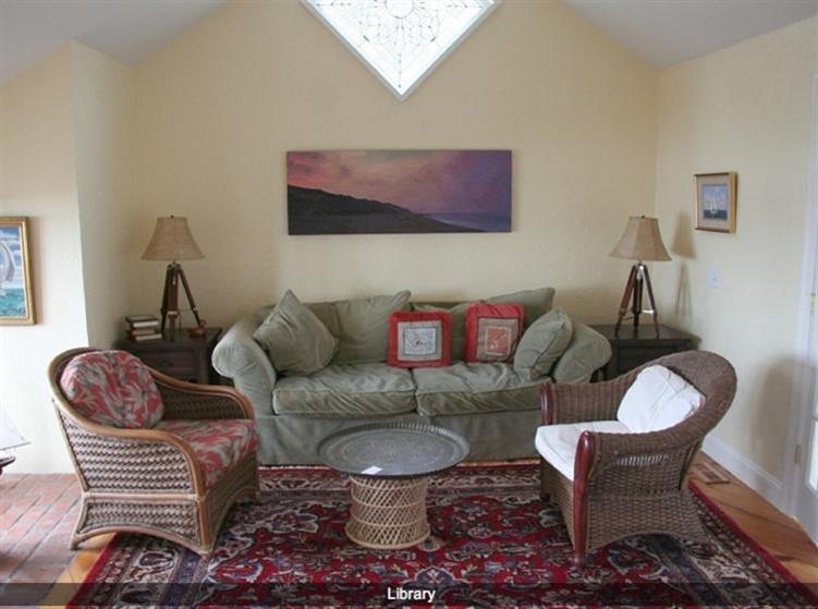 165 Baker Road Wellfleet, MA 02667 - Photo 7 of 20 a living room with furniture and a chair