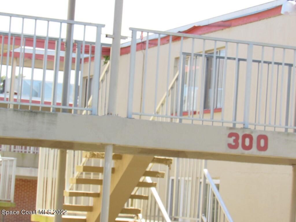 800 North Fiske Boulevard, Unit 310 Cocoa, FL 32922 - Photo 1 of 4 a view of a balcony and car parked