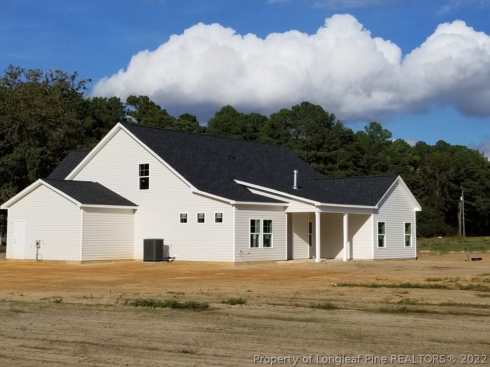 5120-lot2 J T Matthews Road Godwin, NC 28344 - Photo 3 of 5 a view of house with garden