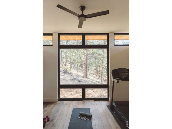 a view of a room with a large window