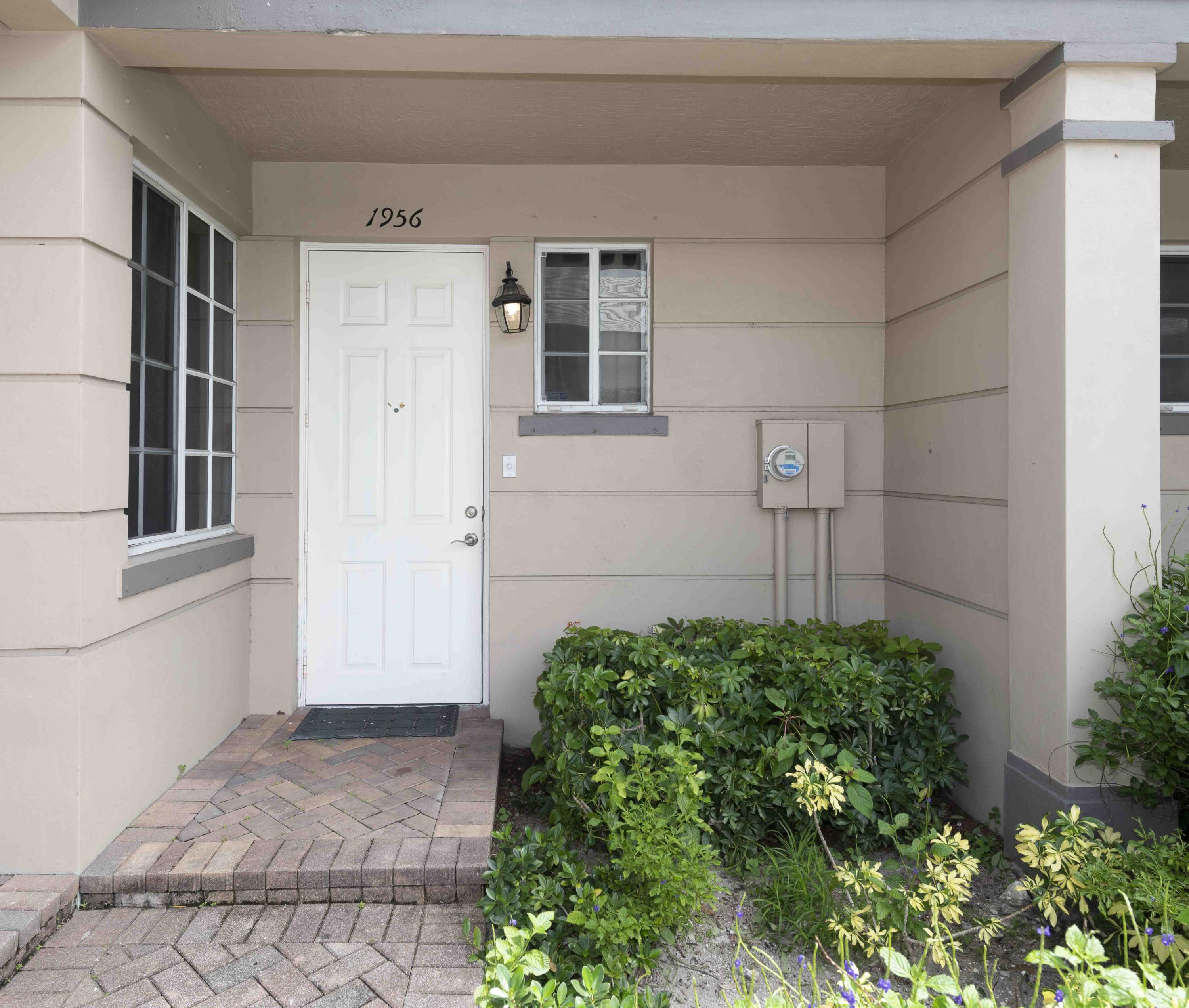 1956 Freeport Drive Riviera Beach, FL 33404 - Photo 1 of 15 1