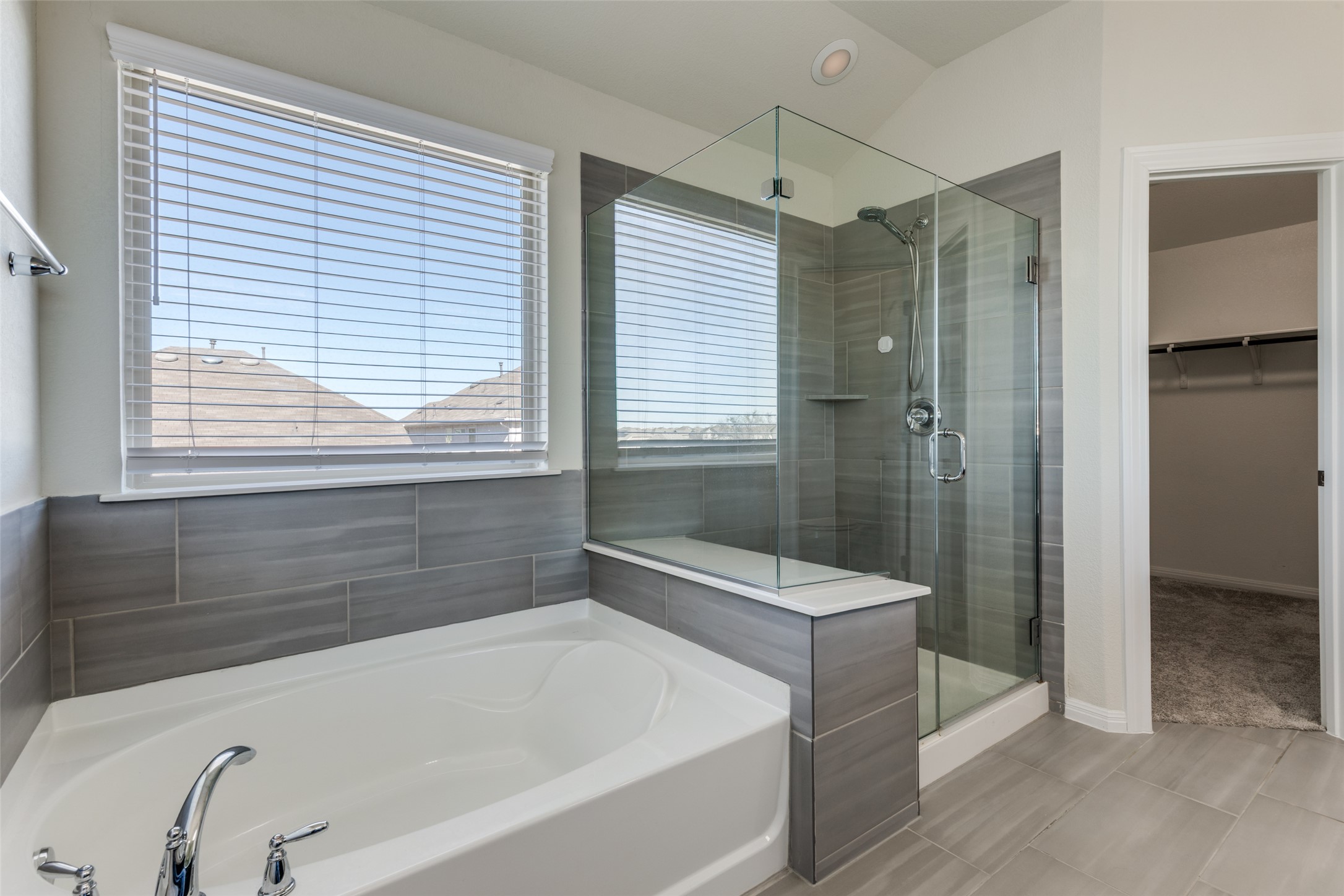 3208 Maysillee Street Austin, TX 78728 - Photo 12 of 23 Full bathroom with a bath, a walk in closet, and shower