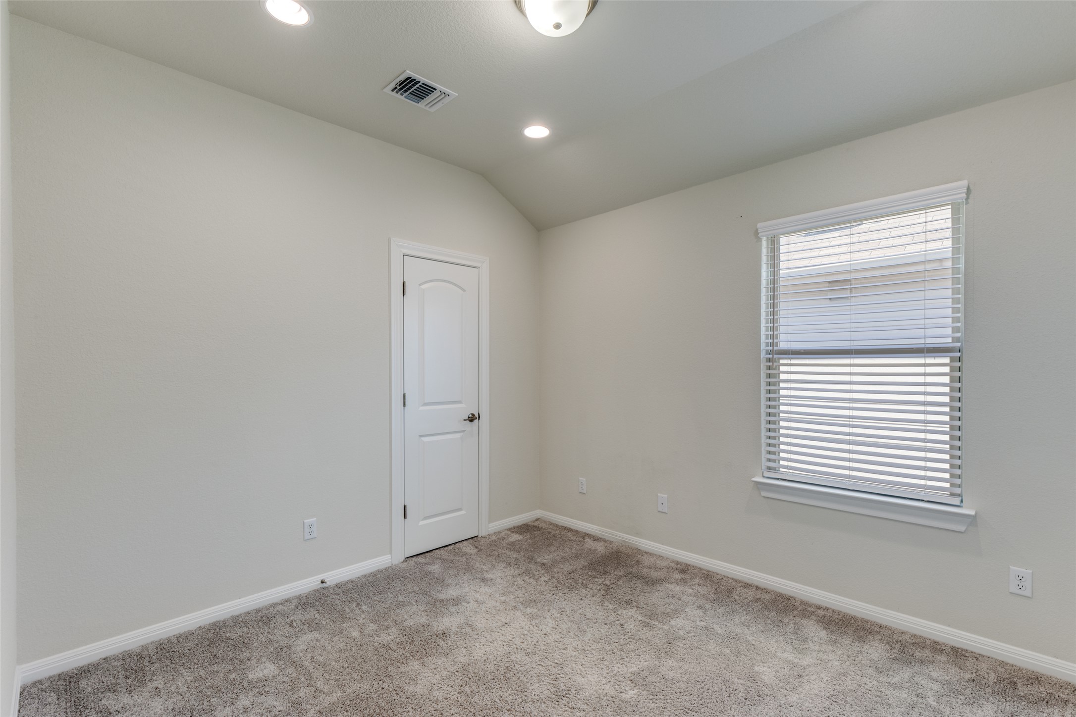 3208 Maysillee Street Austin, TX 78728 - Photo 15 of 23 3rd bedroom with lofted ceiling and recessed lighting