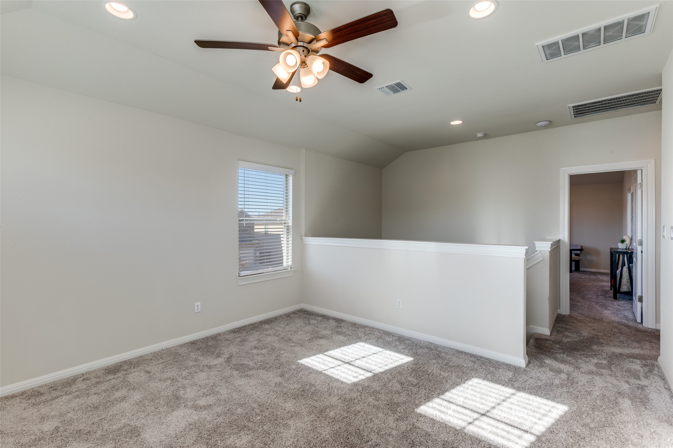 3208 Maysillee Street Austin, TX 78728 - Photo 16 of 23 Loft area with recessed lighting, light carpet, and ceiling fan