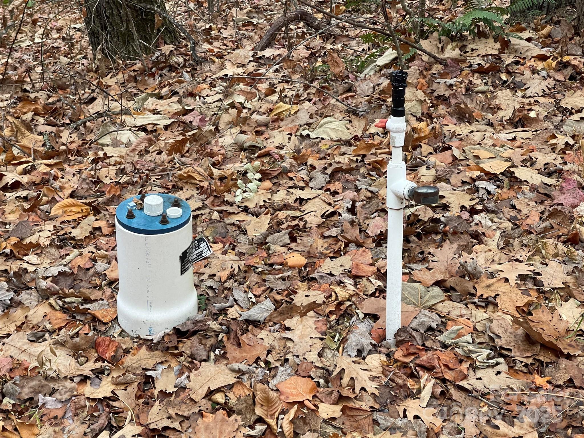 805 Sparkling Fls Road Whittier, NC 28789 - Photo 11 of 33 a water heater and a sink