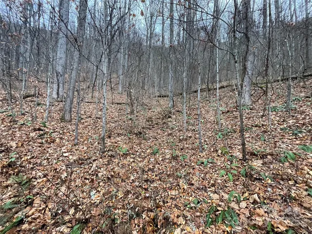 a view of wooden fence of a house