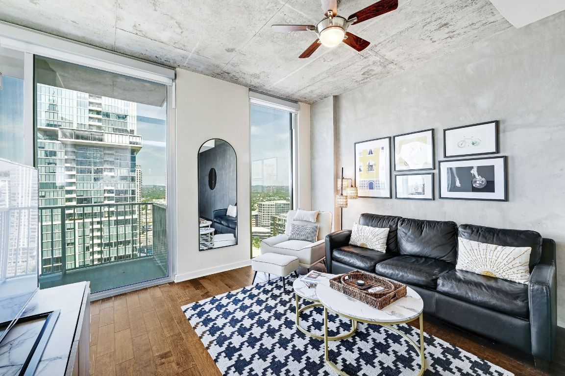 a living room with furniture and a window