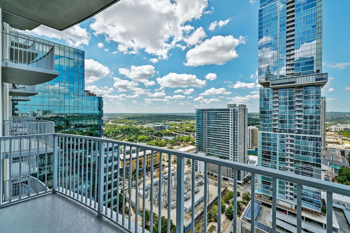 360 Nueces Street, Unit 2808 Austin, TX 78701 - Photo 25 of 29 a view of a balcony with dining table and chairs