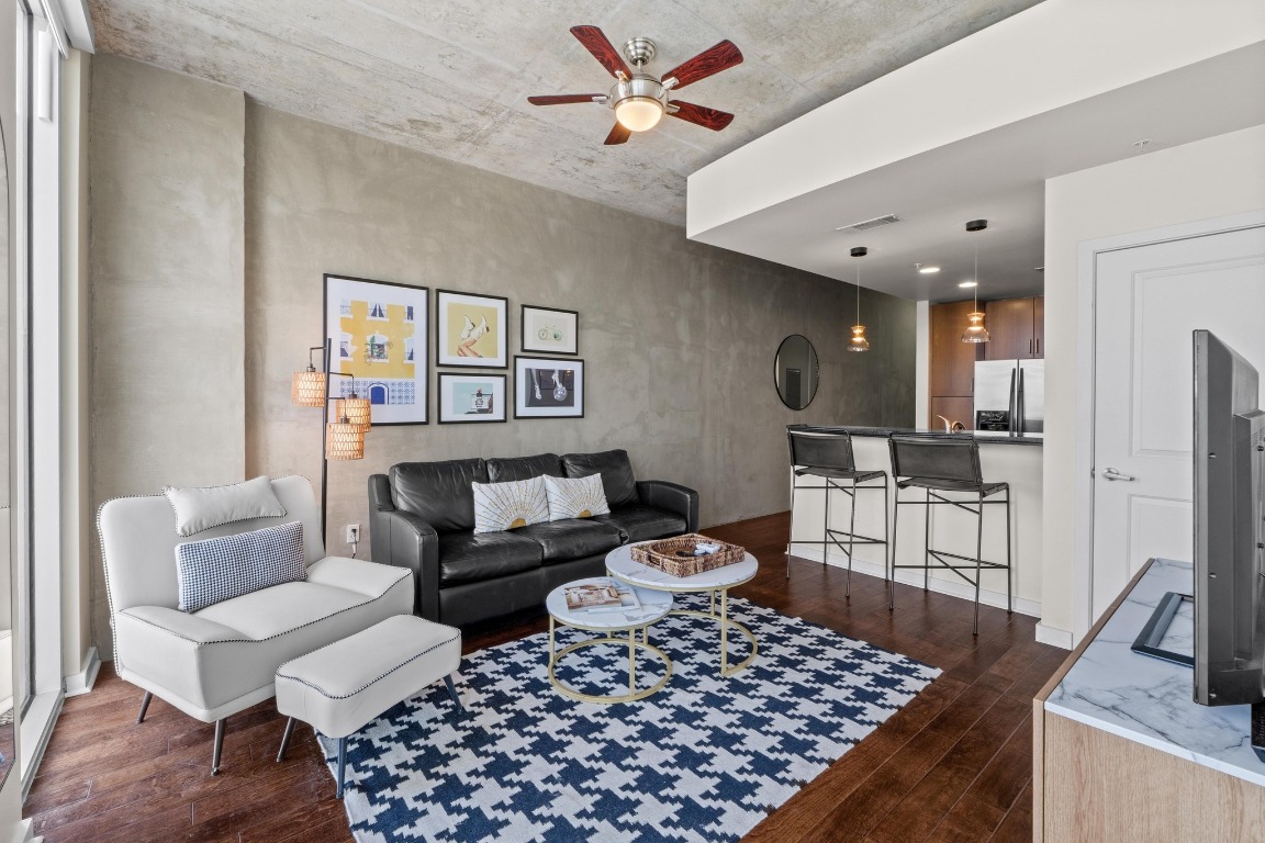 360 Nueces Street, Unit 2808 Austin, TX 78701 - Photo 8 of 29 a living room with furniture and a table