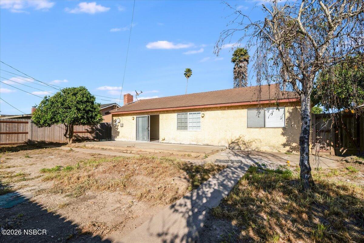 321 North Z Street Lompoc, CA 93436 - Photo 26 of 33 a front view of a house with a yard