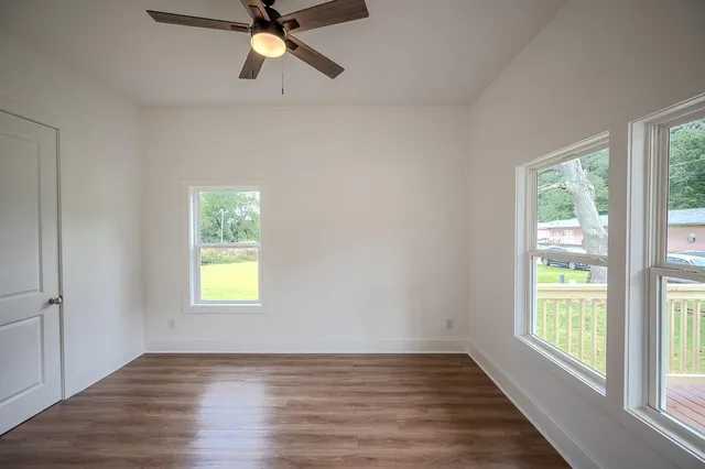 a view of an empty room and window