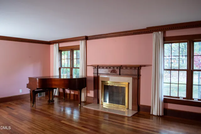 a spacious bathroom with a double vanity sink and a mirror