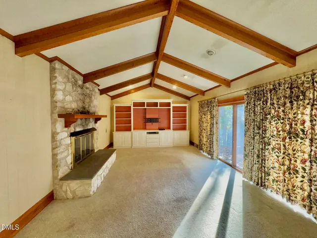 a spacious bathroom with a sink and a mirror