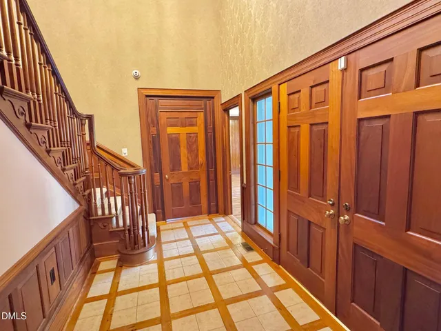 a view of room with a ceiling fan and window