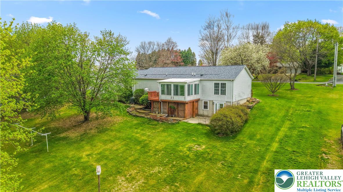 540 Bauer Road Bath, PA 18014 - Photo 2 of 50 a view of a house with a big yard potted plants and large tree