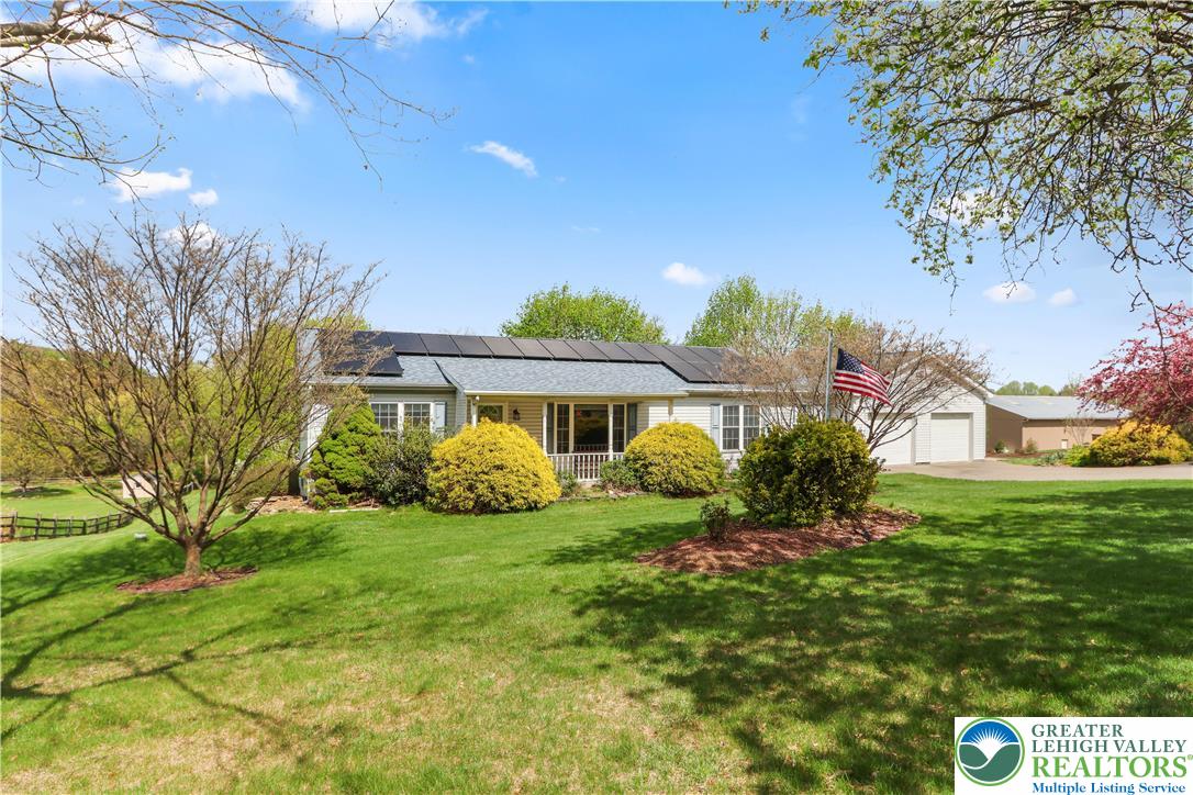 540 Bauer Road Bath, PA 18014 - Photo 5 of 50 a front view of a house with a yard
