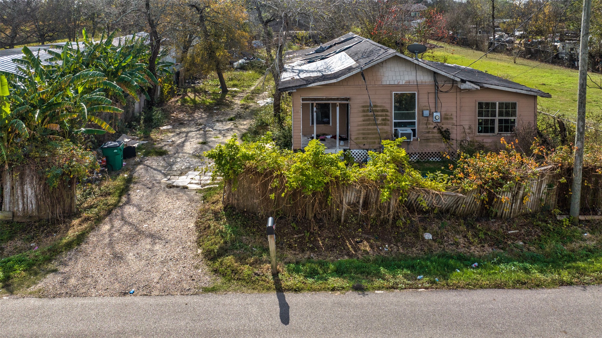 722 North Pine Road Arcola, TX 77583 - Photo 3 of 4 a front view of house with yard and green space