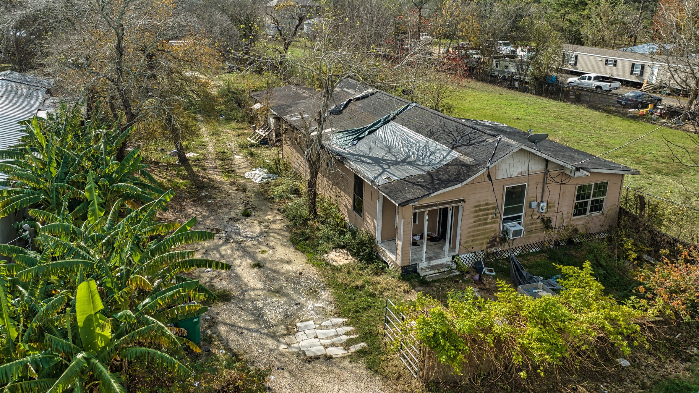 722 North Pine Road Arcola, TX 77583 - Photo 4 of 4 a aerial view of a house with a yard