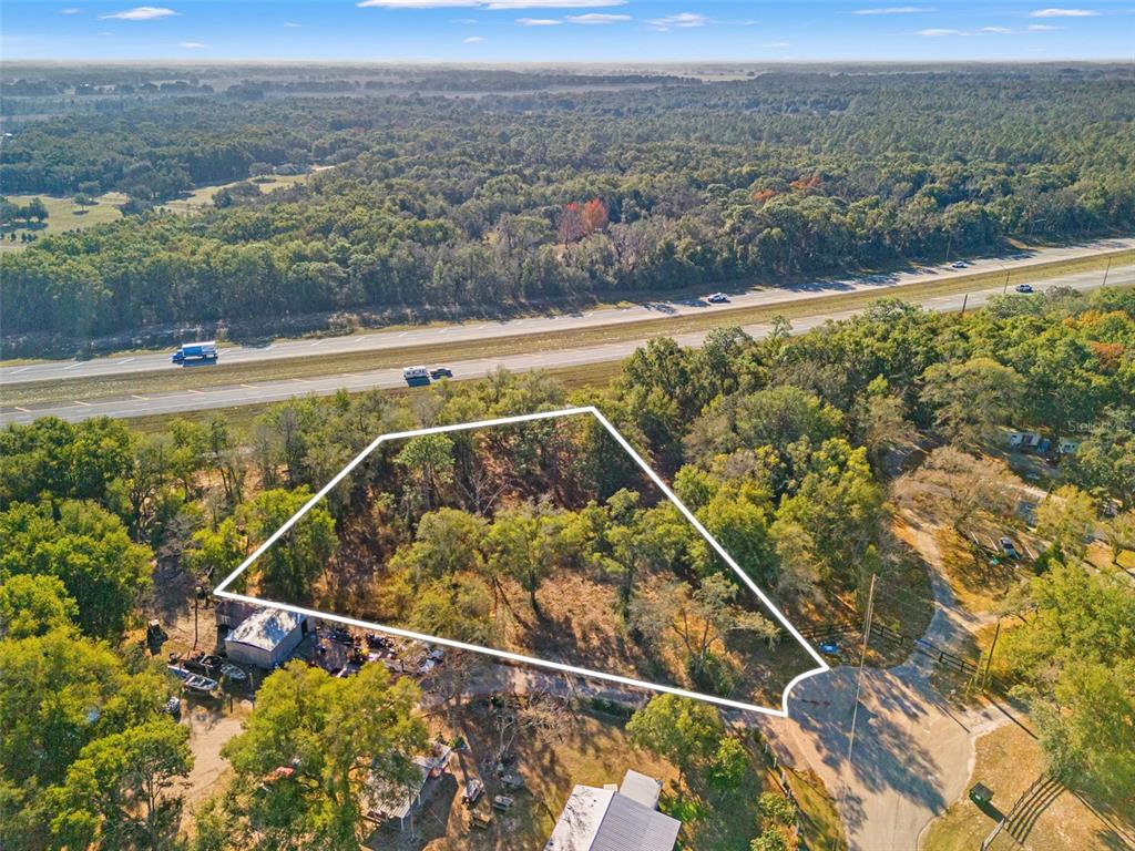 16800 Delft Place Spring Hill, FL 34610 - Photo 12 of 15 a view of a tennis court