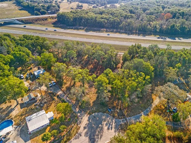 a view of a yard with an outdoor space