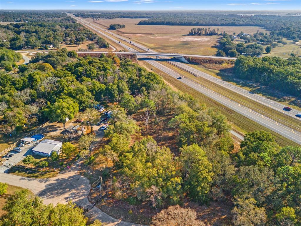 16800 Delft Place Spring Hill, FL 34610 - Photo 6 of 15 a view of a yard with a outdoor space