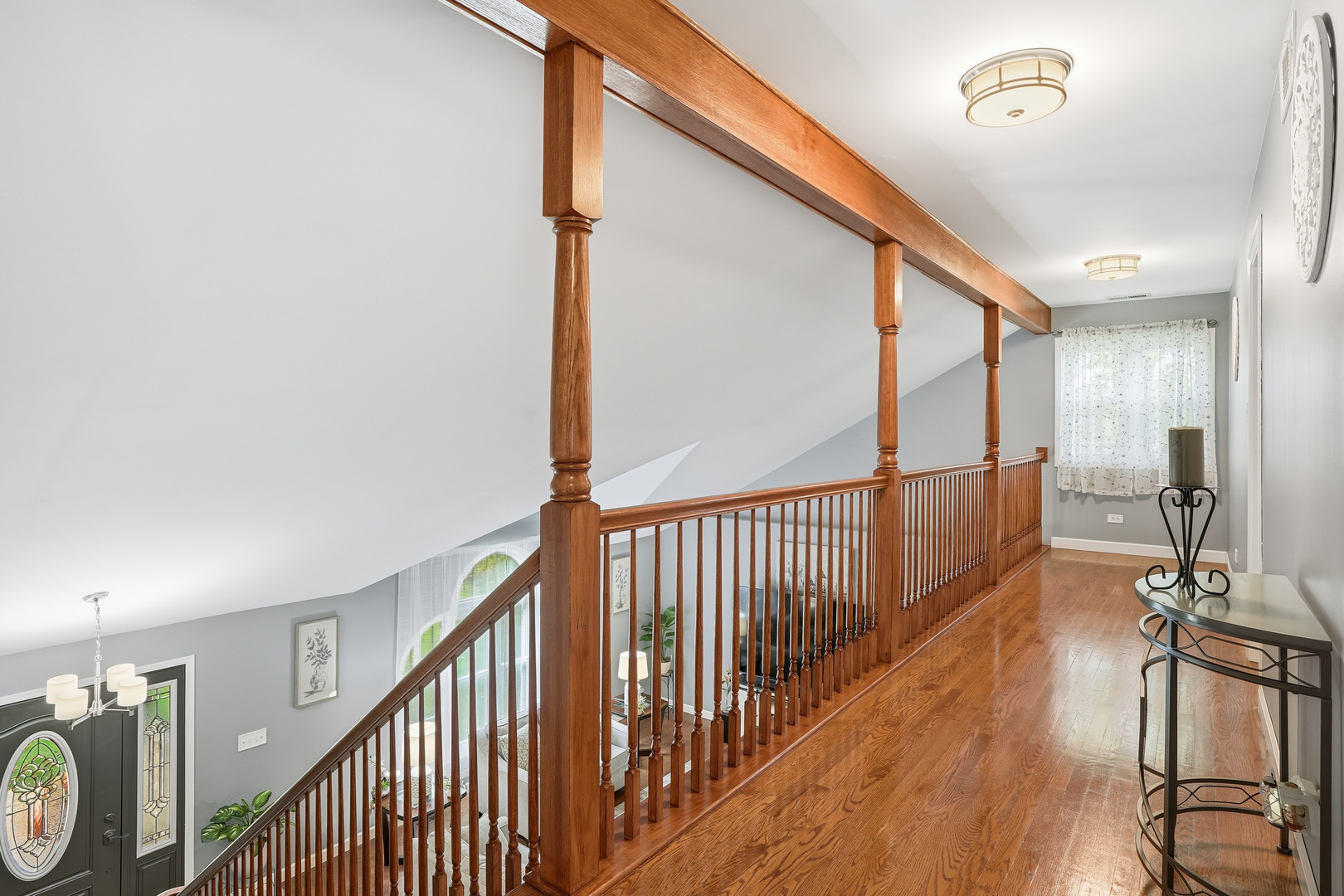 11254 192nd Street Mokena, IL 60448 - Photo 21 of 48 a view of a hallway with wooden floor and stairs