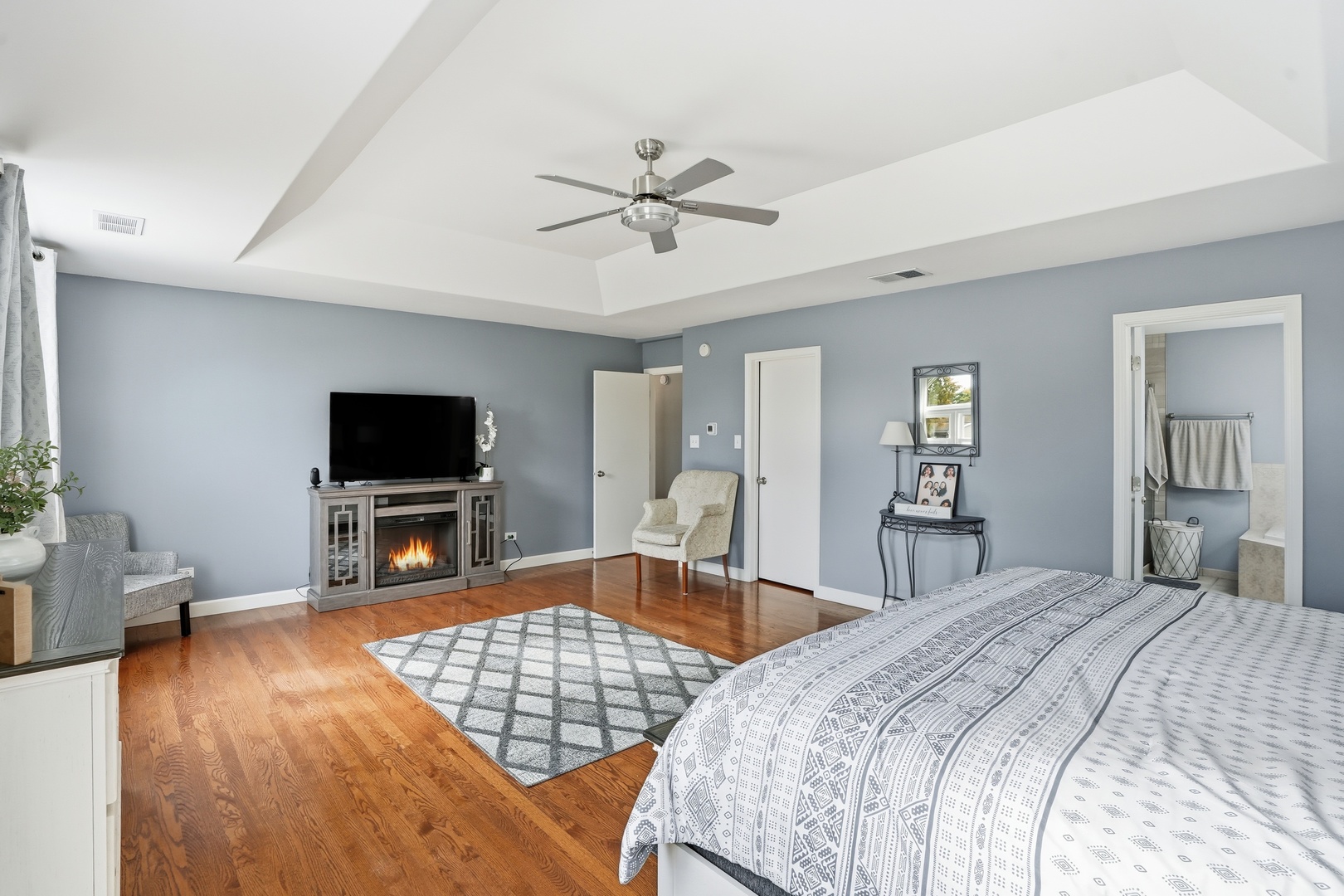 11254 192nd Street Mokena, IL 60448 - Photo 22 of 48 a bedroom with a bed and a flat screen tv