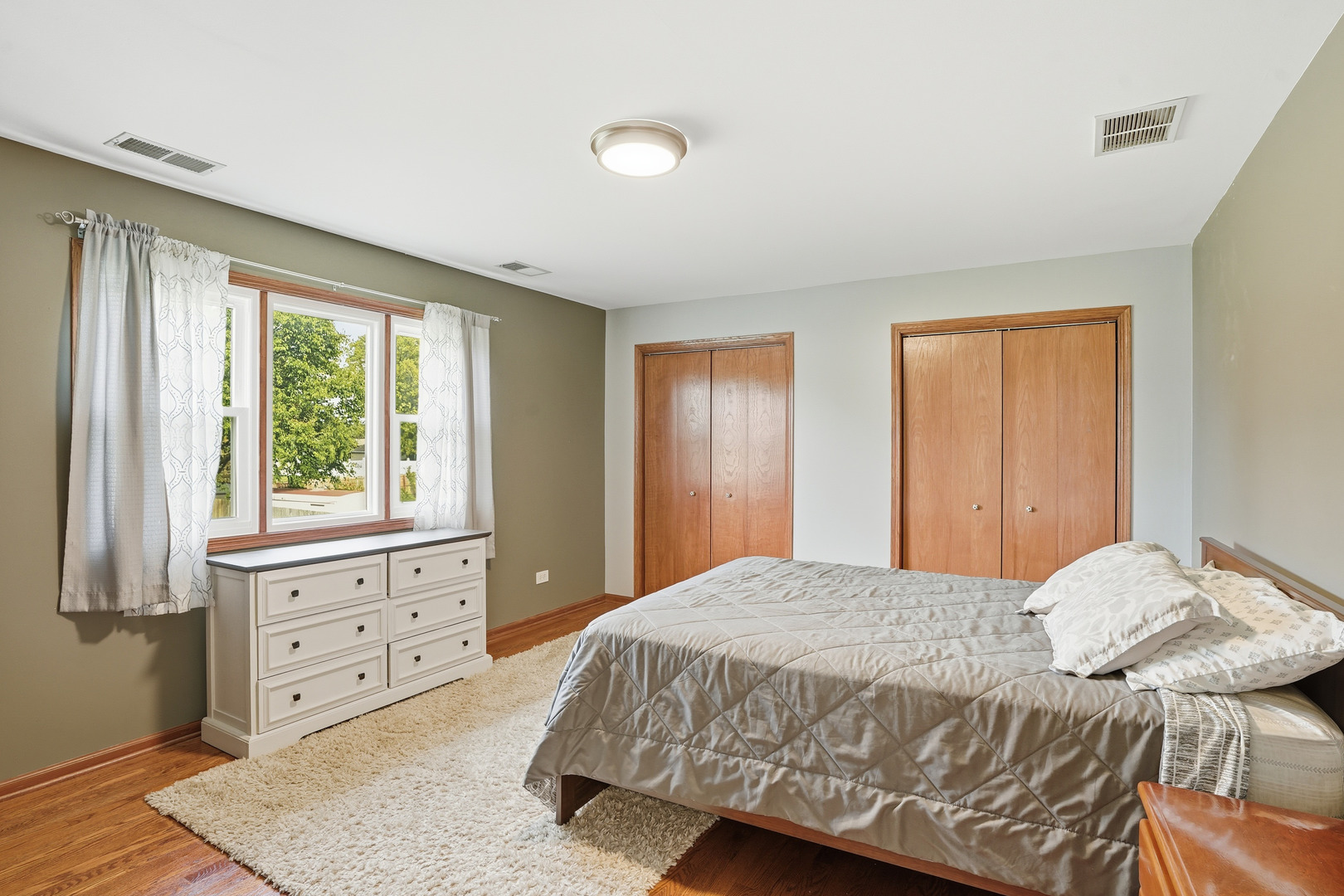 11254 192nd Street Mokena, IL 60448 - Photo 23 of 48 a bedroom with a large bed and a window