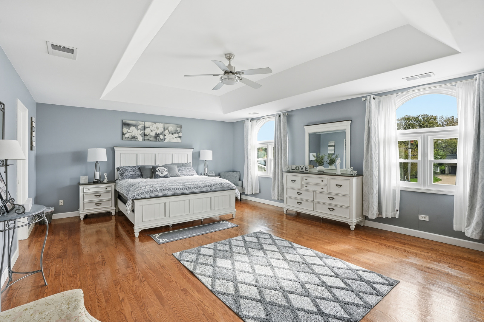 11254 192nd Street Mokena, IL 60448 - Photo 24 of 48 a bedroom with a bed and wooden floor