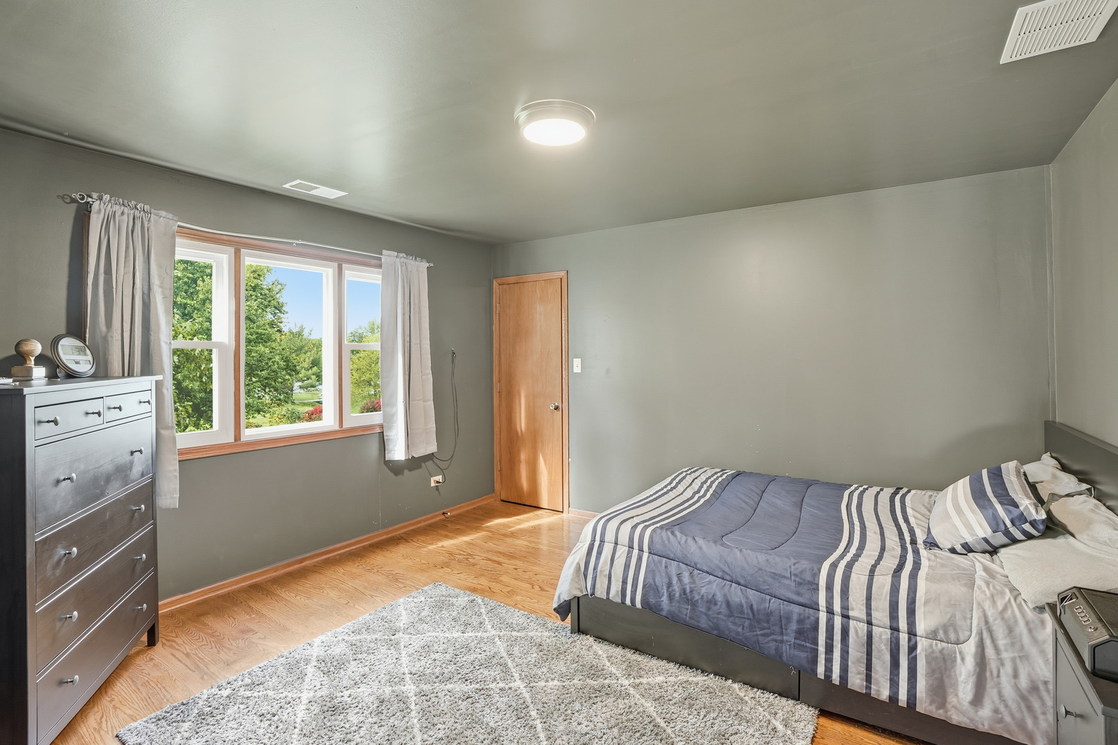 11254 192nd Street Mokena, IL 60448 - Photo 27 of 48 a bedroom with a bed and a window