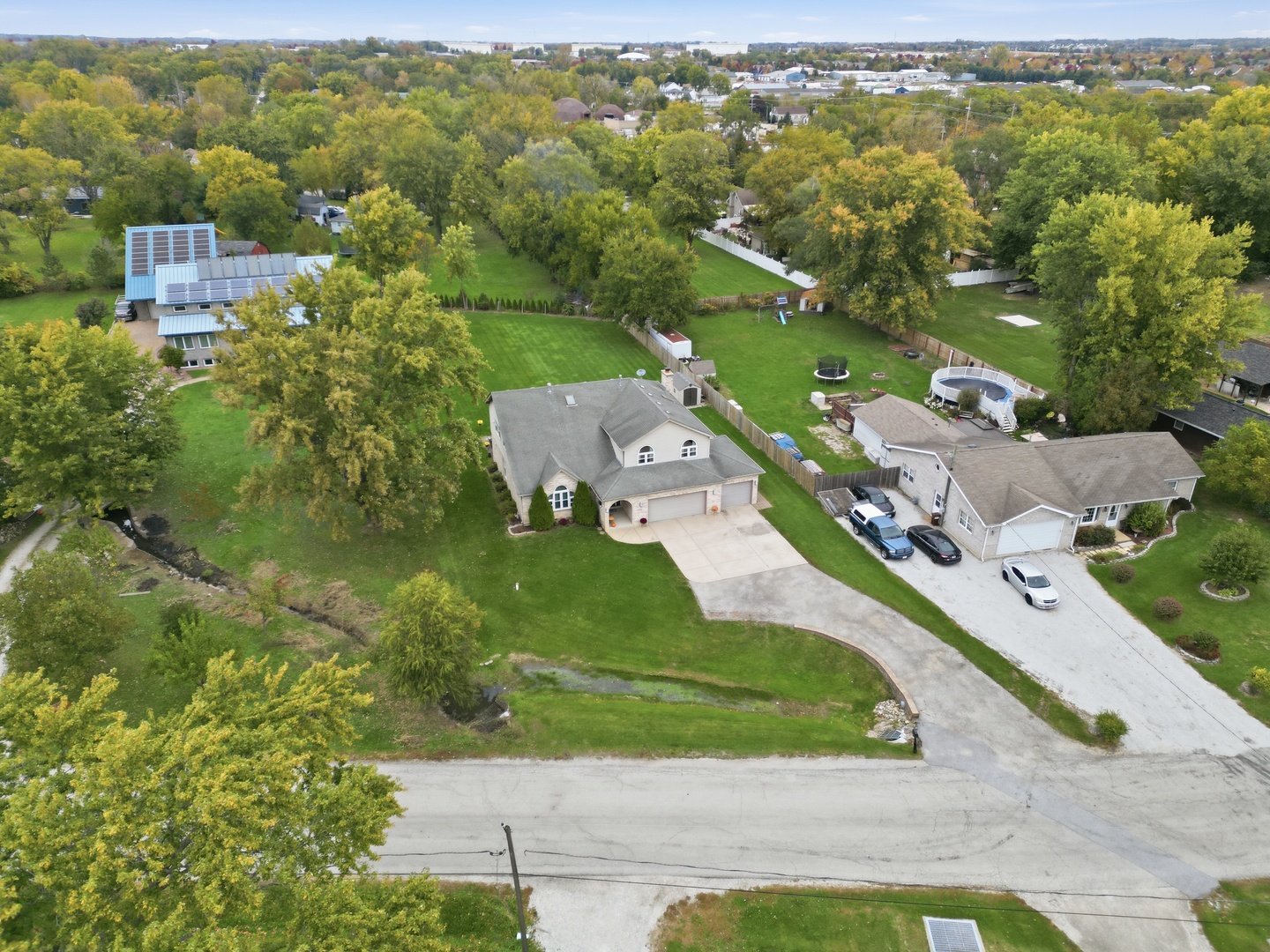 11254 192nd Street Mokena, IL 60448 - Photo 42 of 48 an aerial view of a house with a yard basket ball court and outdoor seating