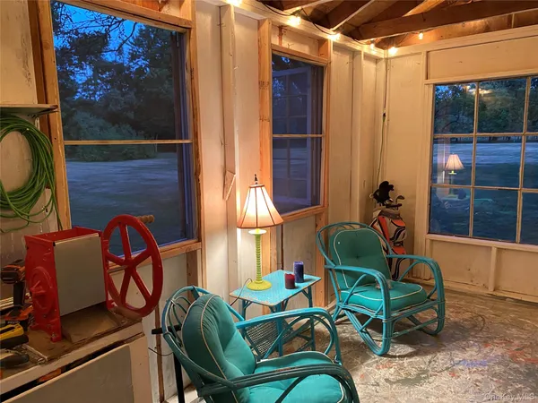 a view of outdoor space with a sink and window