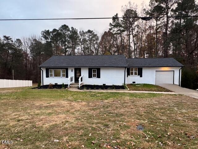 1005 East Hanover Road Graham, NC 27253 - Photo 2 of 8 a front view of a house with a yard